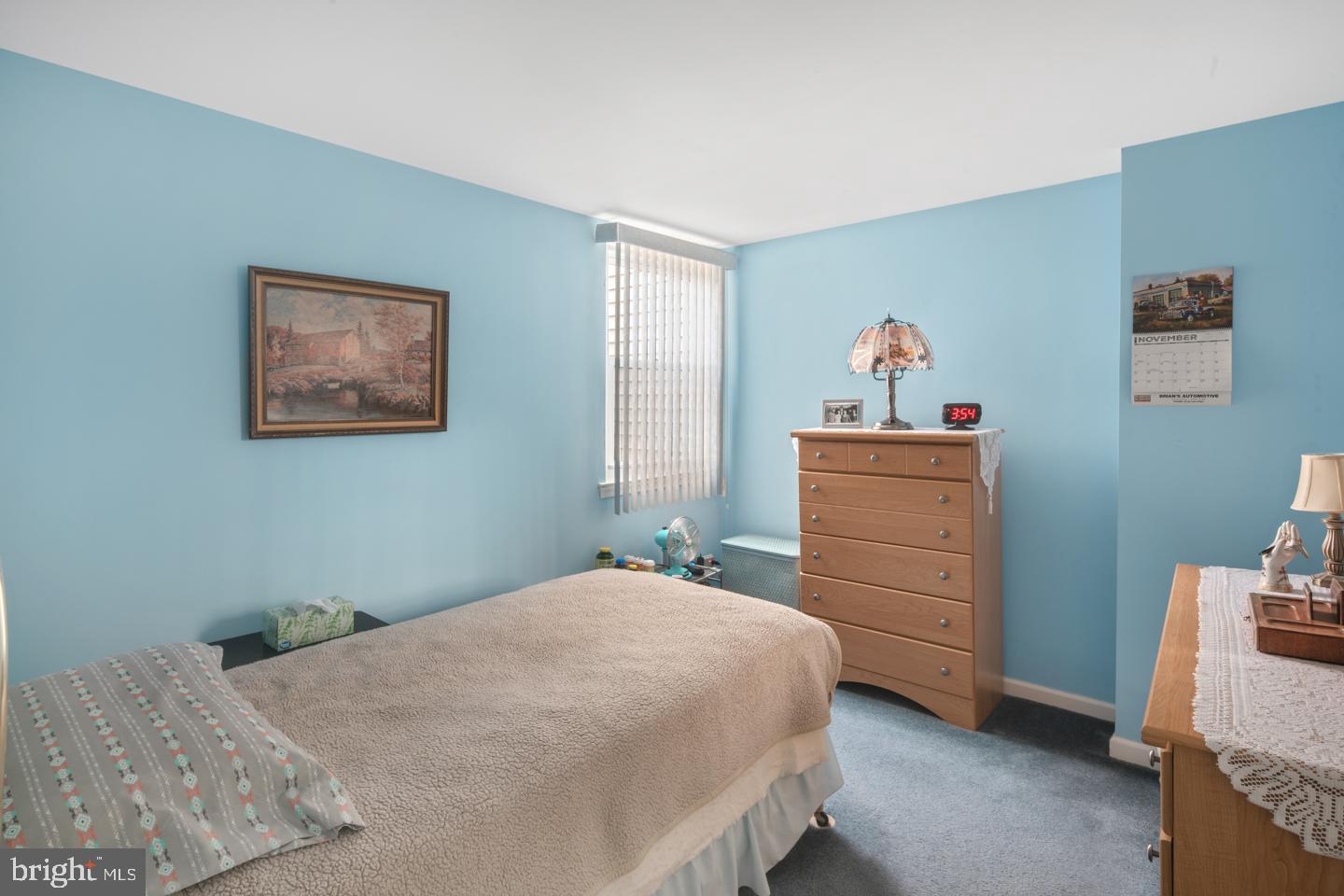 10803 Pedrick Road Philadelphia, PA 19154 - Photo 16 of 25 a bedroom with a bed and a window