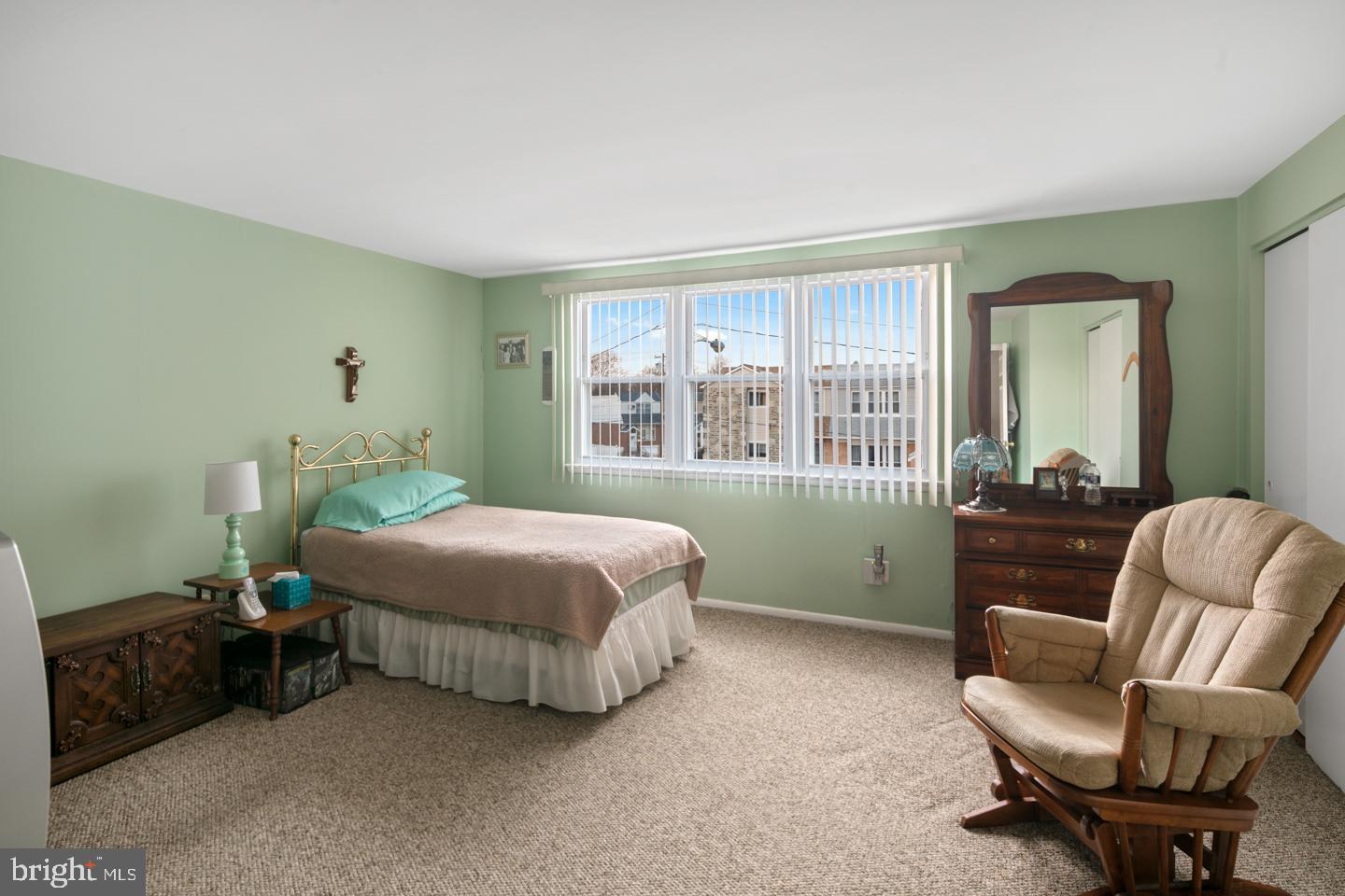 10803 Pedrick Road Philadelphia, PA 19154 - Photo 18 of 25 a bedroom with a bed and a couch