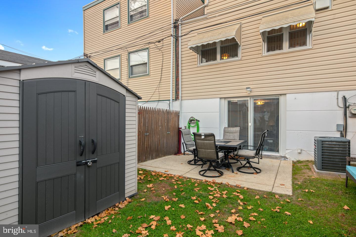 10803 Pedrick Road Philadelphia, PA 19154 - Photo 23 of 25 a view of a dinning table and chairs in patio of the house