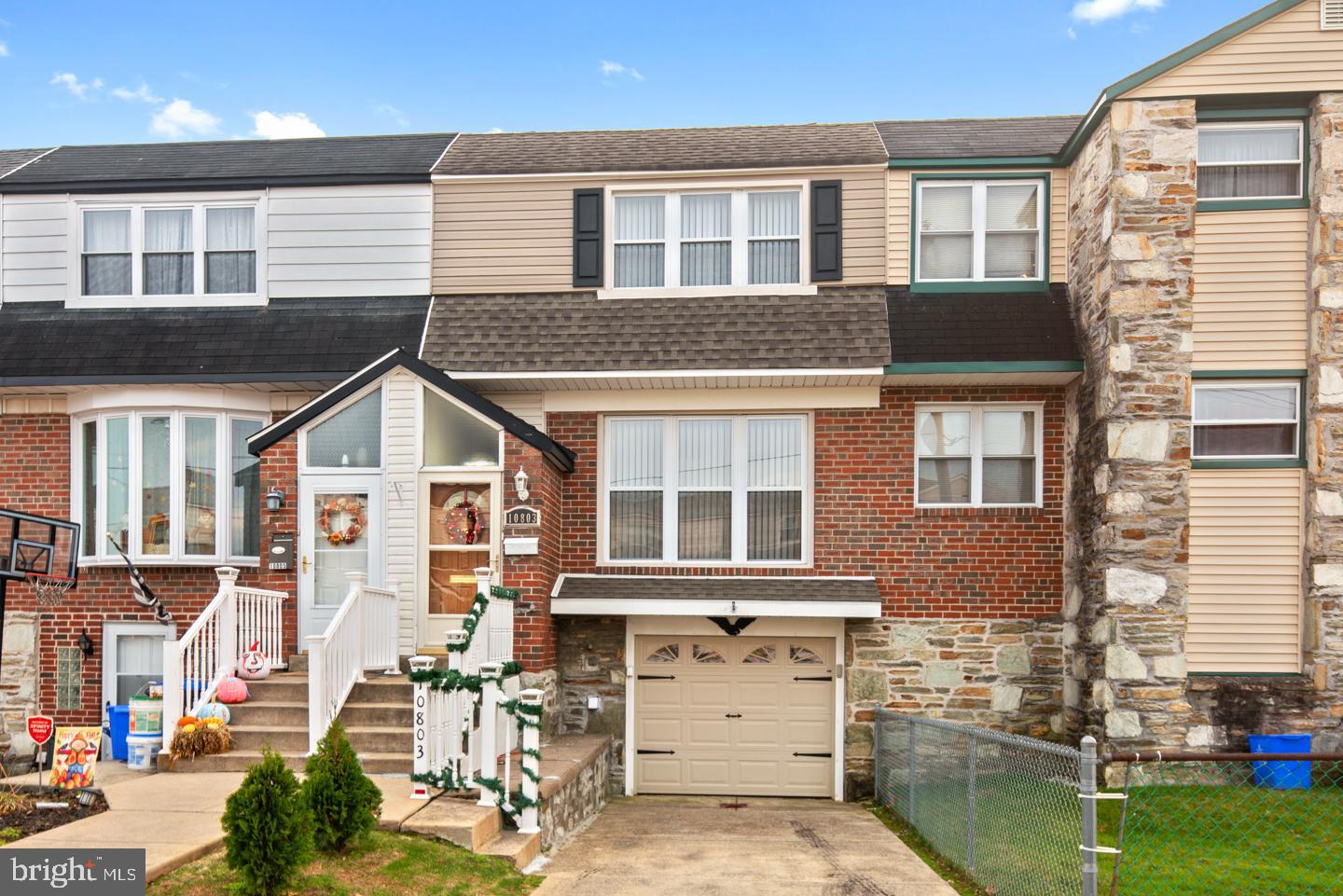 10803 Pedrick Road Philadelphia, PA 19154 - Photo 25 of 25 front view of a house with a yard