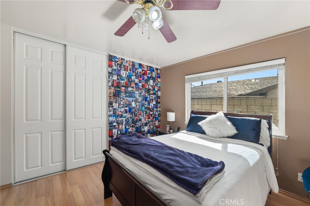 7221 Ramona Avenue Rancho Cucamonga, CA 91701 - Photo 17 of 30 a bedroom with a bed and a window