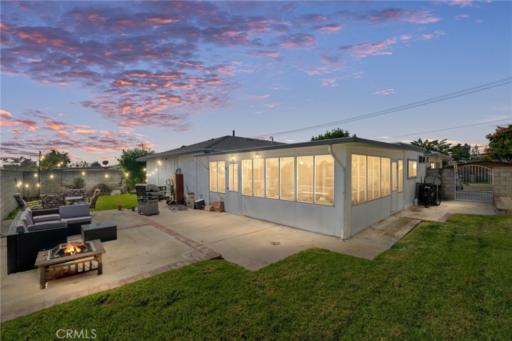 7221 Ramona Avenue Rancho Cucamonga, CA 91701 - Photo 2 of 30 a view of a house with backyard and sitting area