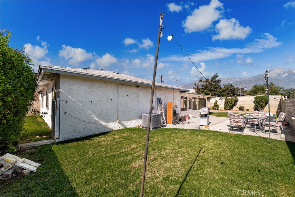 7221 Ramona Avenue Rancho Cucamonga, CA 91701 - Photo 25 of 30 a view of a house with backyard and sitting area