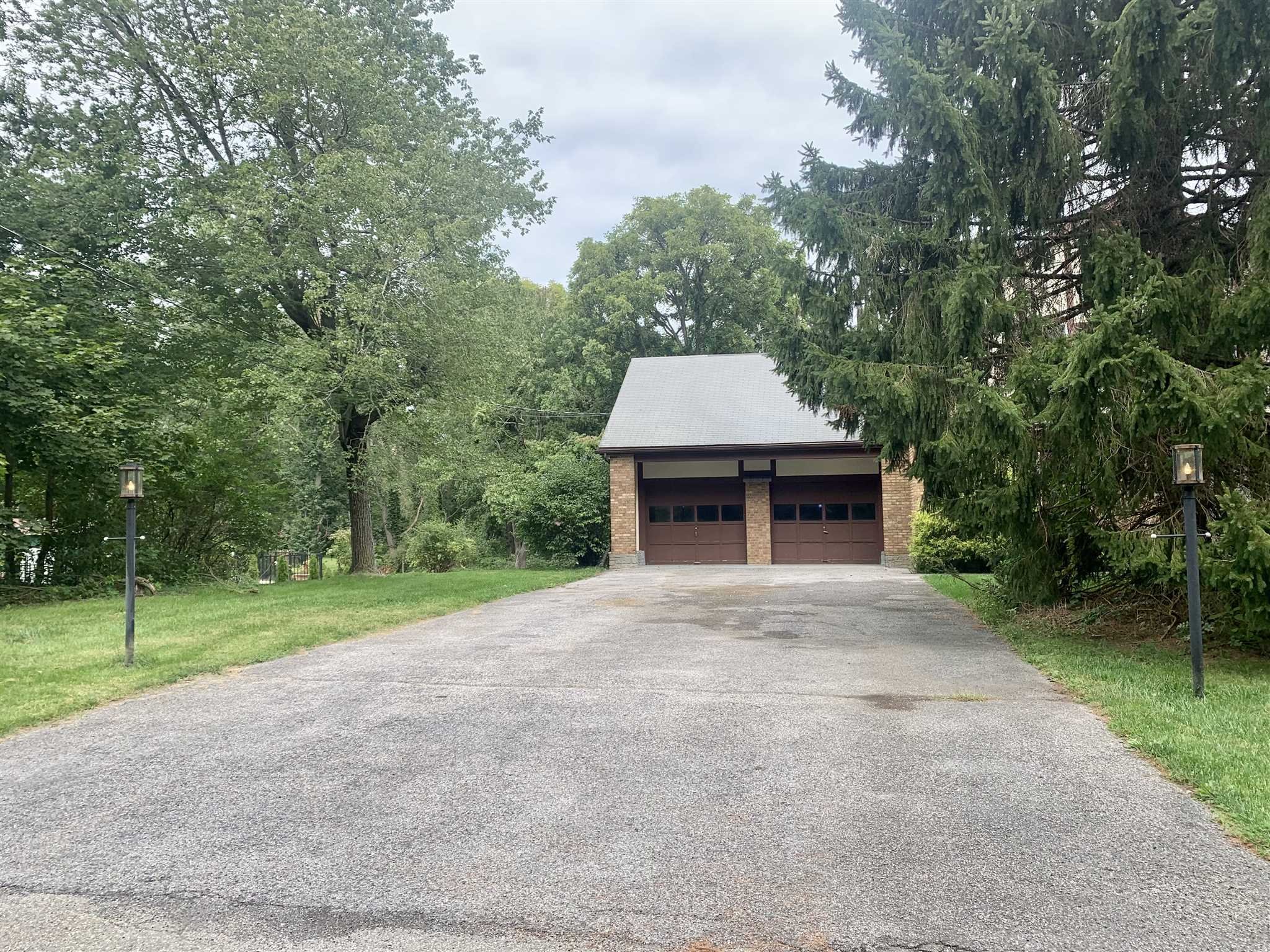 5 Alexander Road East Fishkill, NY 12533 - Photo 29 of 33 a front view of a house with a yard and trees