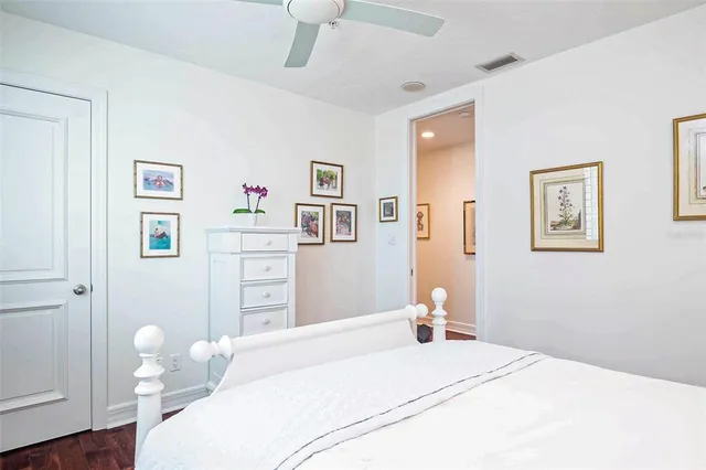 a balcony with table and chairs