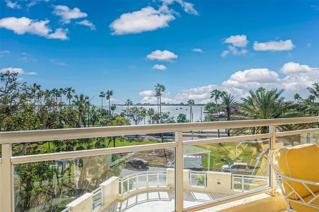 a bedroom with a bed and book shelf