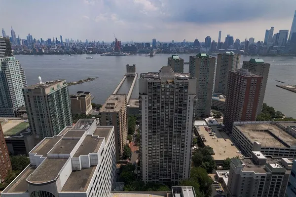 a view of a city with tall buildings