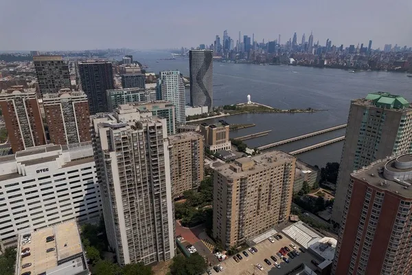 a view of a city with tall buildings