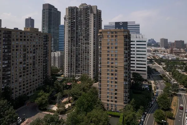 a view of a city with tall buildings