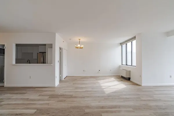 a view of an empty room and window