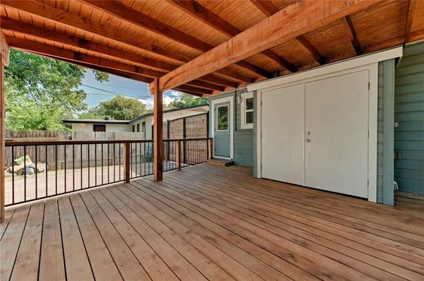 a view of backyard with wooden floor