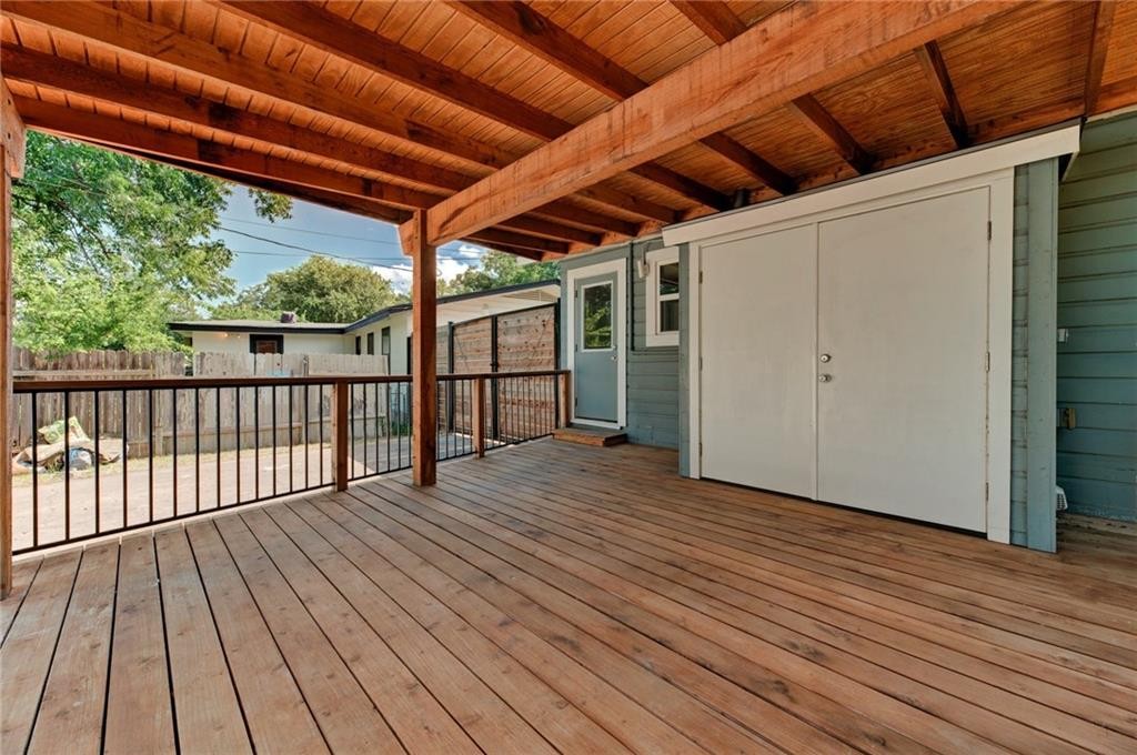8318 Burrell Drive Austin, TX 78757 - Photo 21 of 27 a view of backyard with wooden floor