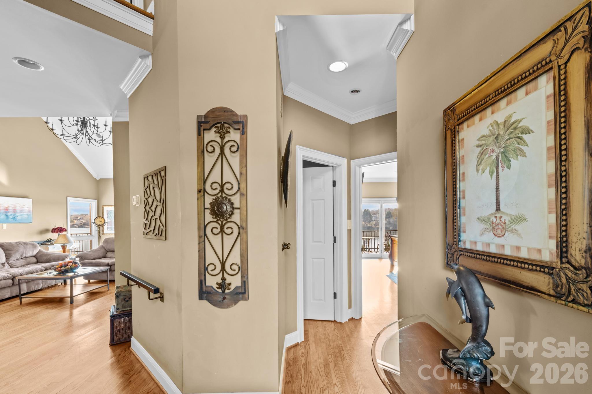 121 Pleasant Point Drive Hickory, NC 28601 - Photo 16 of 46 a view of a hallway with wooden floor and windows