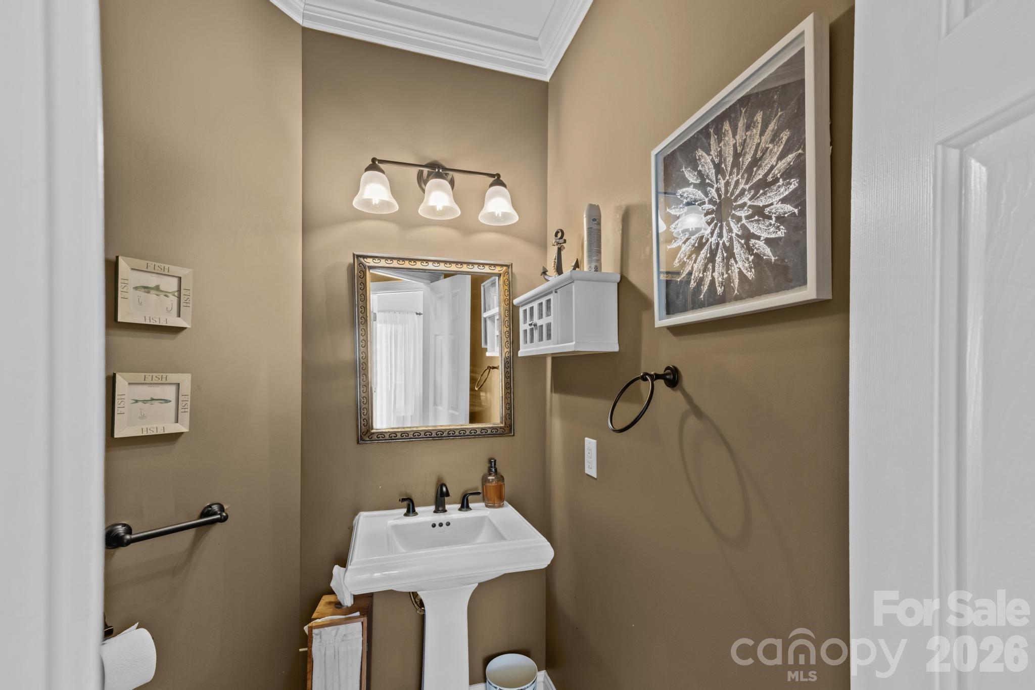 121 Pleasant Point Drive Hickory, NC 28601 - Photo 17 of 46 a bathroom with a sink mirror and vanity