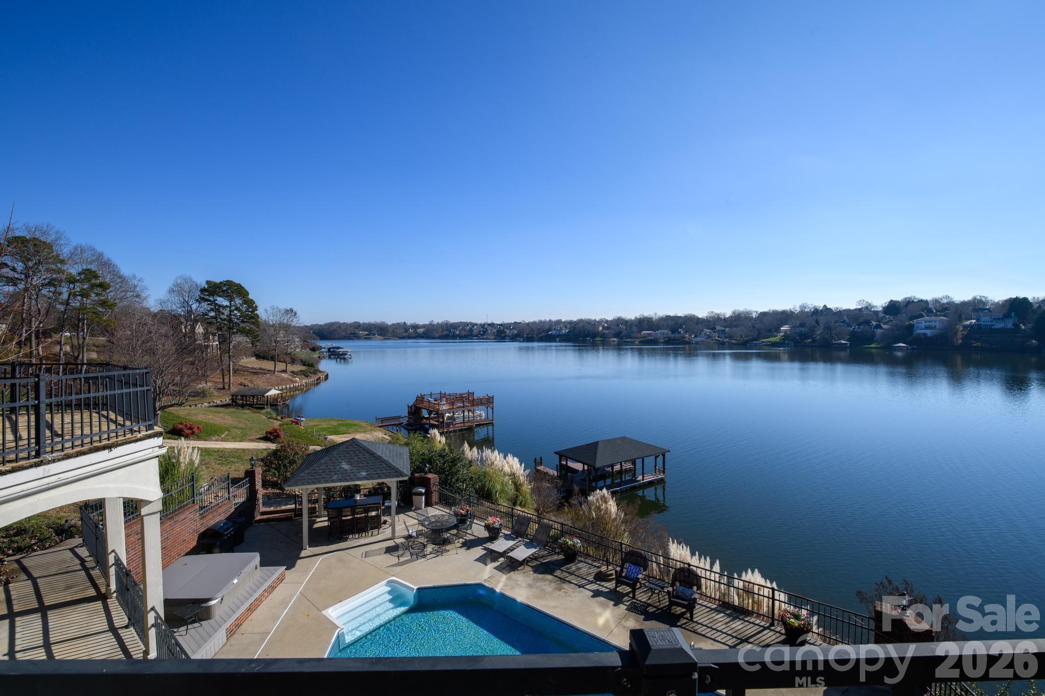 121 Pleasant Point Drive Hickory, NC 28601 - Photo 20 of 46 a view of a lake with couches chairs