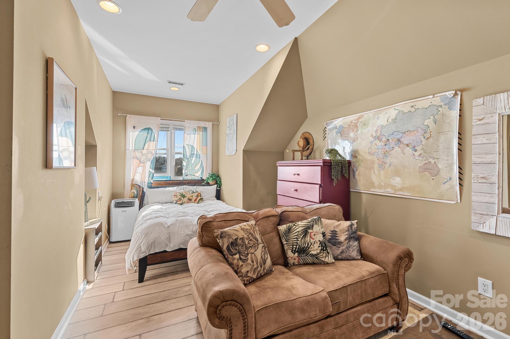 121 Pleasant Point Drive Hickory, NC 28601 - Photo 27 of 46 a bedroom with furniture and a wooden floor