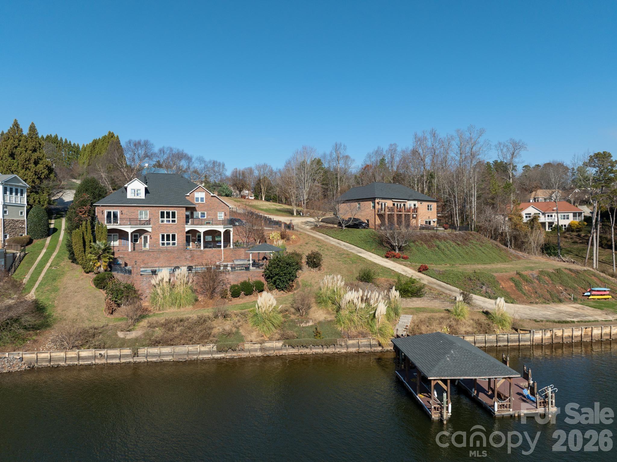121 Pleasant Point Drive Hickory, NC 28601 - Photo 4 of 46 a view of residential houses with outdoor space and lakeside