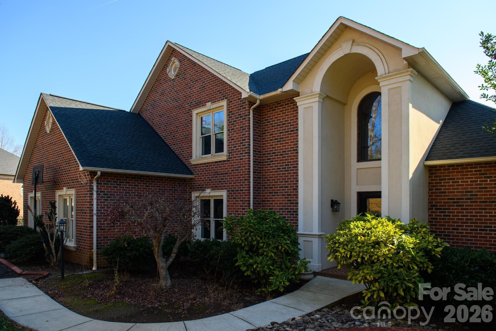 121 Pleasant Point Drive Hickory, NC 28601 - Photo 43 of 46 a front view of a house with garden