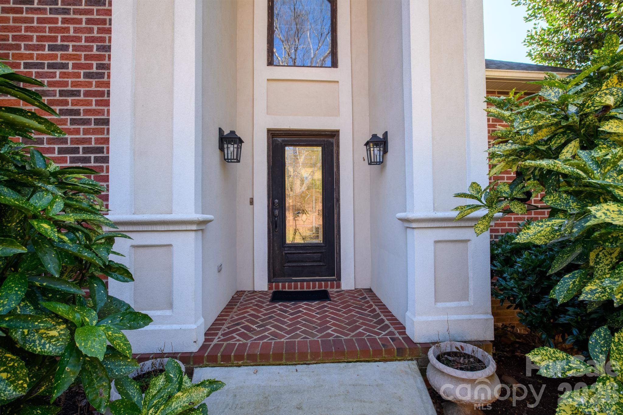 121 Pleasant Point Drive Hickory, NC 28601 - Photo 5 of 46 a front view of a house with a garden