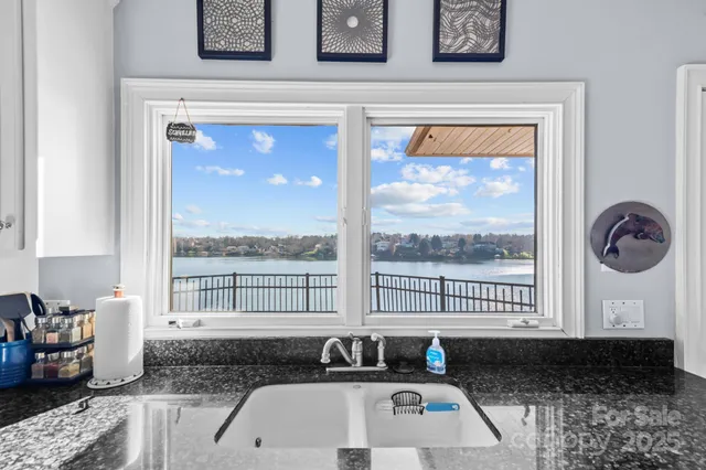 a view of balcony with wooden floor and city view