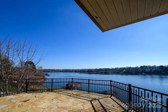 a kitchen with cabinets and window