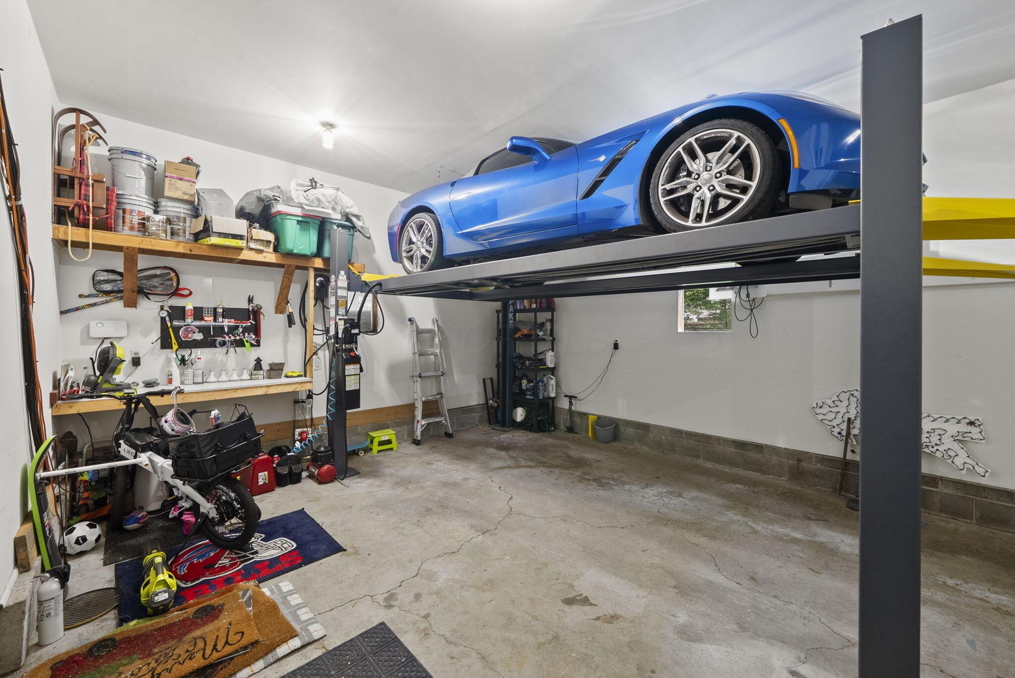 1851 Berkshire Road Columbus, OH 43221 - Photo 70 of 125 Extra high ceilings in this tandem 3 car garage, 4 if you use the lift.