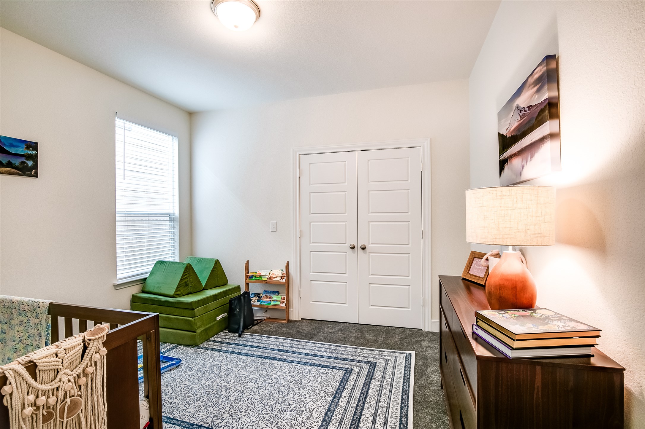 7616 Groundhog Way Austin, TX 78744 - Photo 25 of 34 a living room with furniture and a window