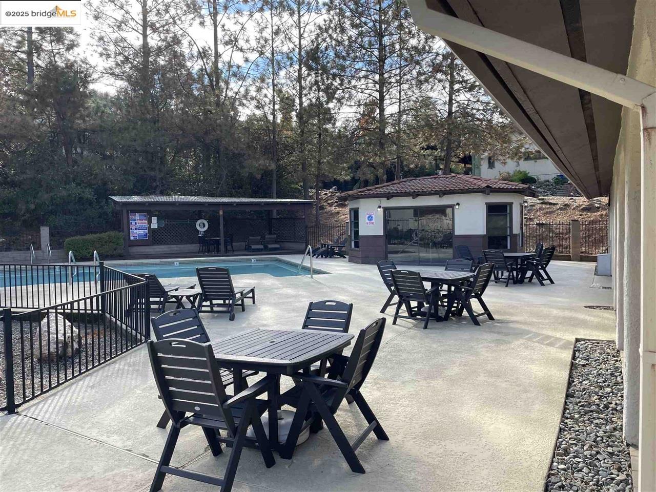 18717 Mill Villa Road, Unit 612 Jamestown, CA 95327 - Photo 8 of 22 a view of a dinning table and chairs in the roof deck