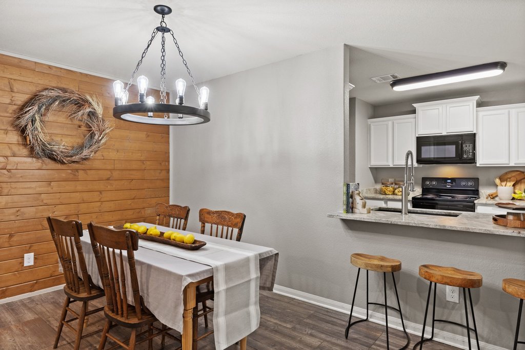 217 Farmer Lane Jarrell, TX 76537 - Photo 7 of 29 Dining space flows seamlessly into your kitchen, creating an inviting atmosphere for daily living.