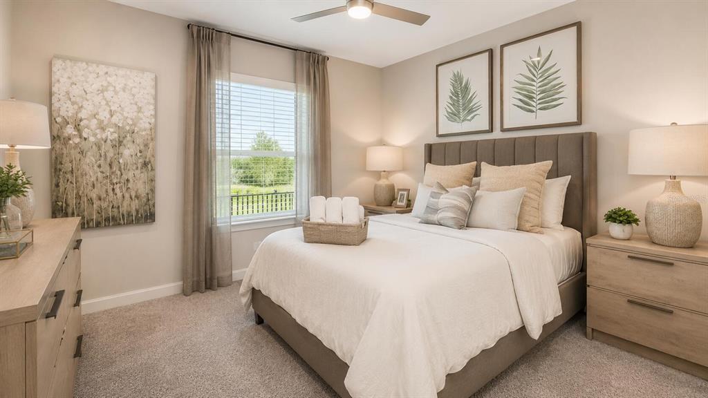 33320 Castaway Loop Wesley Chapel, FL 33543 - Photo 12 of 23 a bedroom with a bed and a window