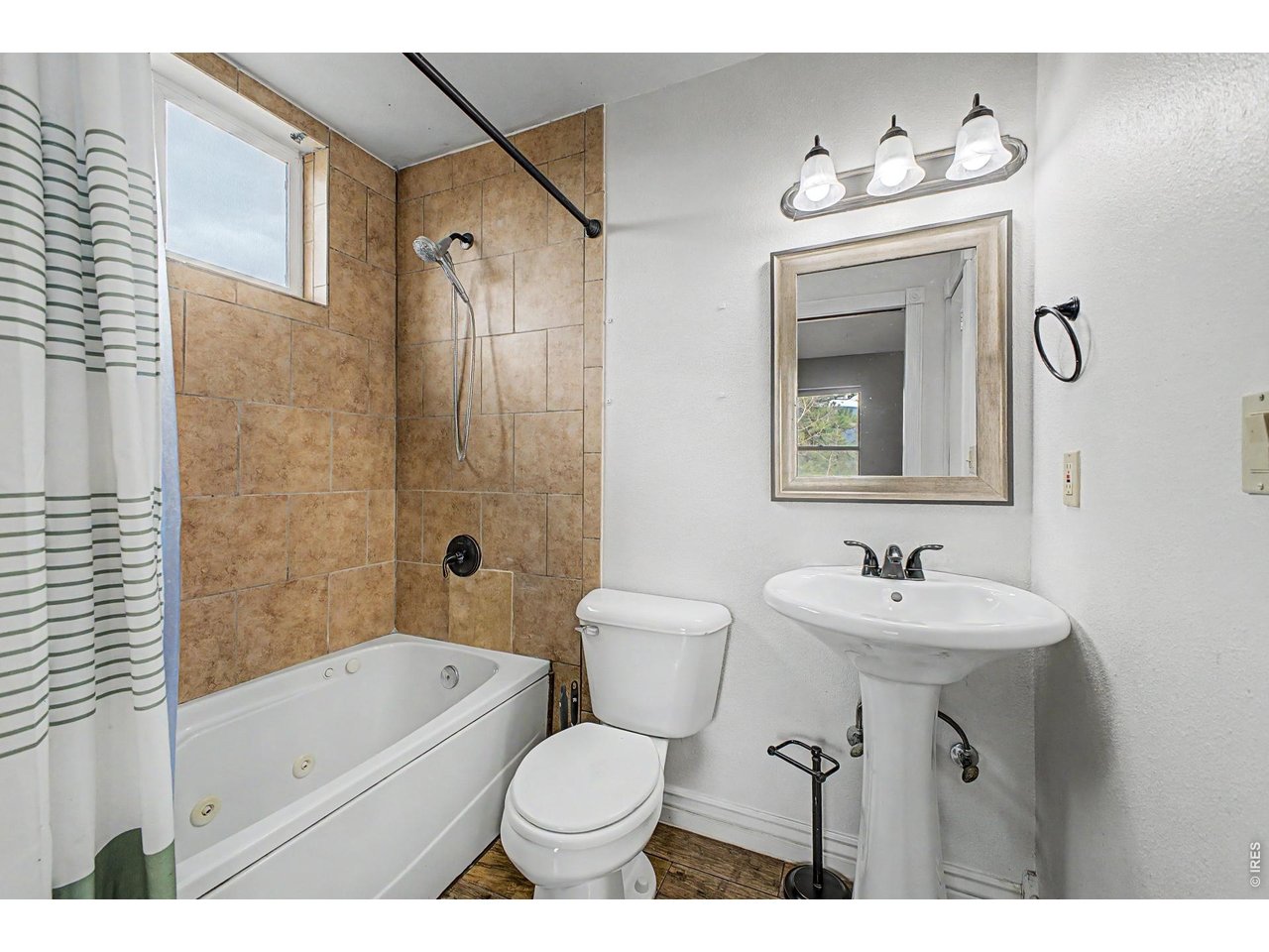 76 Highlands Drive Bailey, CO 80421 - Photo 33 of 49 a bathroom with a sink toilet tub and shower