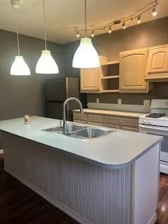 a view of an empty room with closet