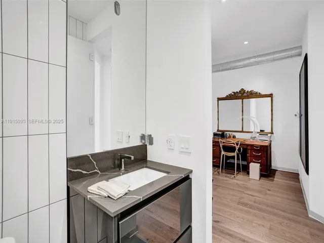 a workspace with furniture and wooden floor