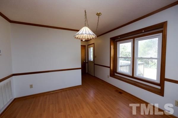 143 Riders Ridge Lane Willow Spring, NC 27592 - Photo 4 of 12 Dining area is attached to the kitchen area.