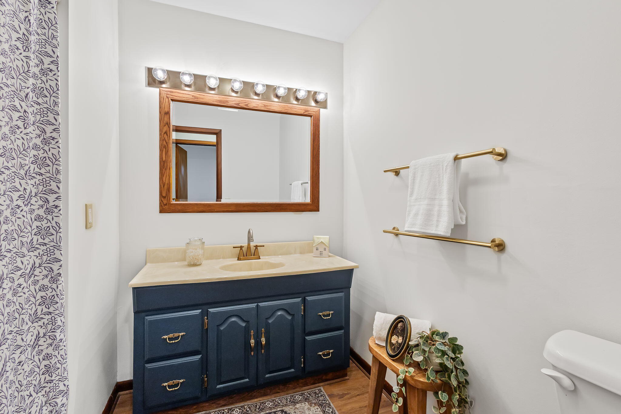 708 East Maple Street Rensselaer, IN 47978 - Photo 17 of 33 a bathroom with a sink vanity and mirror