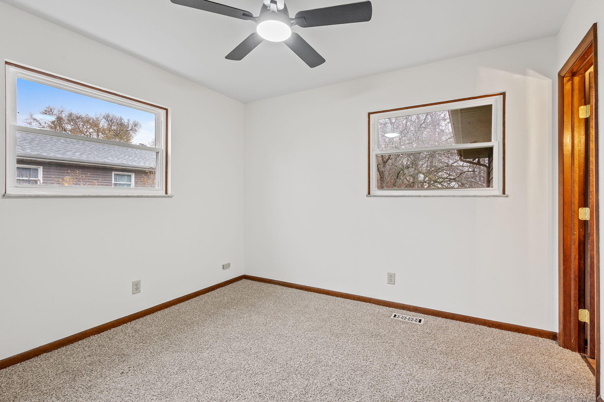 708 East Maple Street Rensselaer, IN 47978 - Photo 21 of 33 a view of an empty room with a painting on the wall