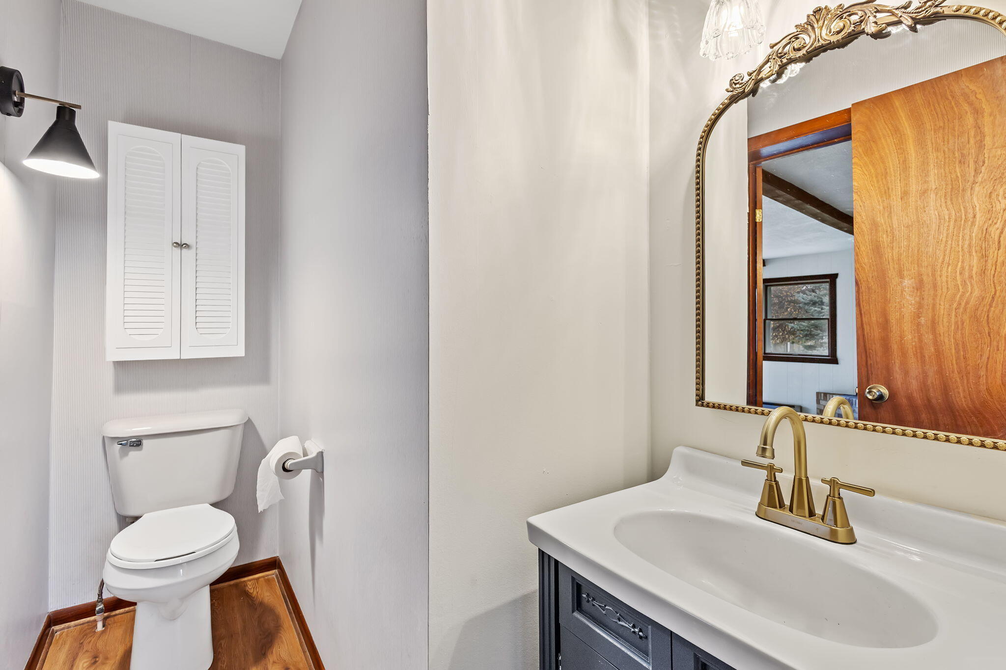 708 East Maple Street Rensselaer, IN 47978 - Photo 23 of 33 a bathroom with a sink toilet and mirror