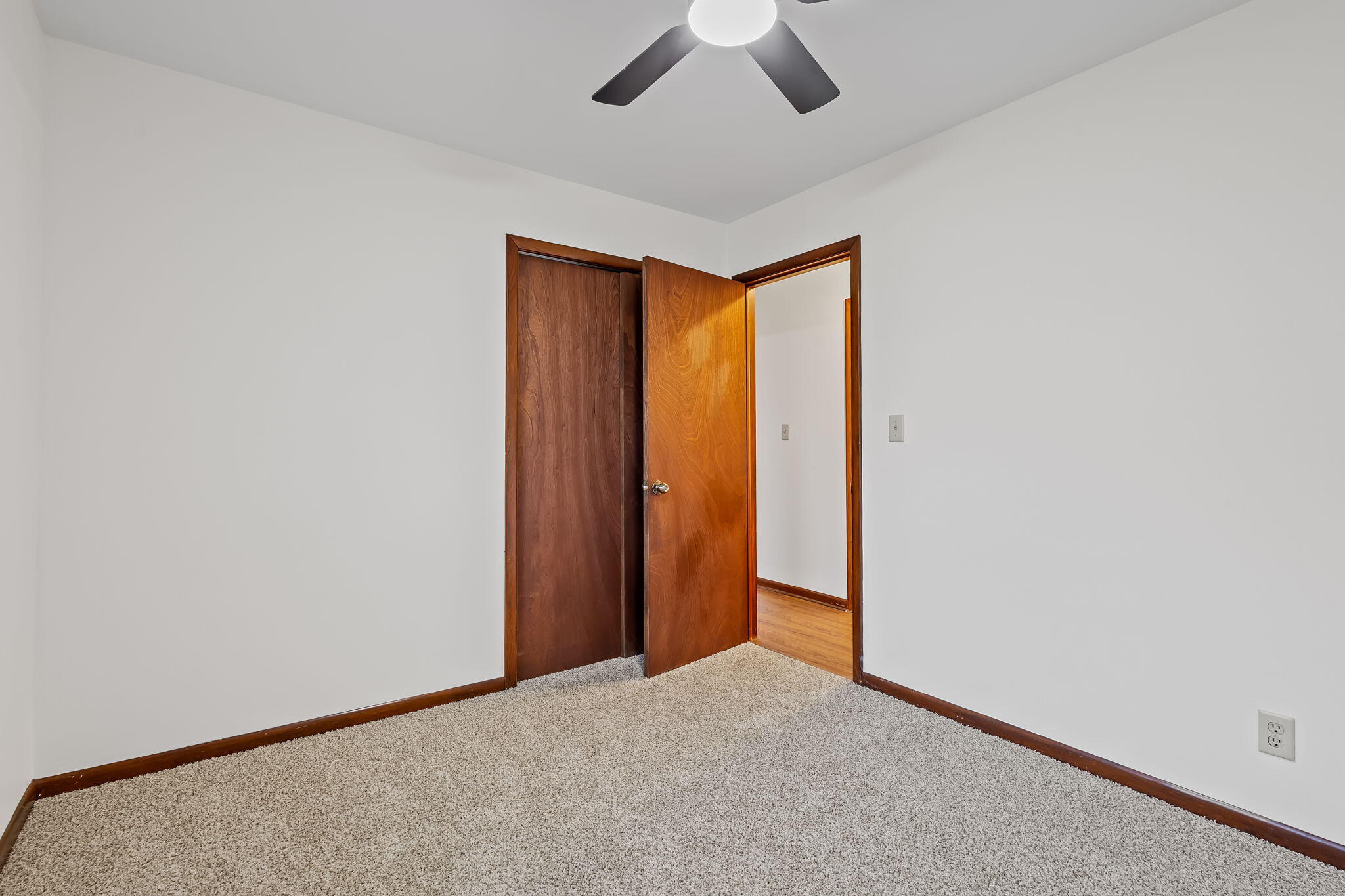 708 East Maple Street Rensselaer, IN 47978 - Photo 25 of 33 an empty room with chandelier fan