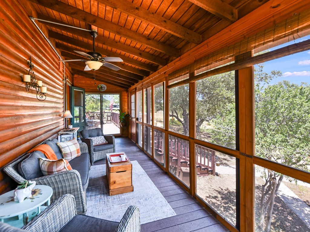 254 Middleton Road Spicewood, TX 78669 - Photo 10 of 32 a outdoor space with wooden floor and outdoor seating