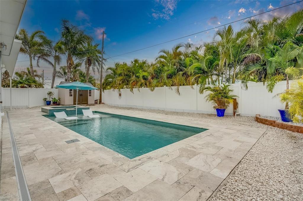 16108 Redington Drive Redington Beach, FL 33708 - Photo 12 of 13 a view of outdoor space yard and swimming pool