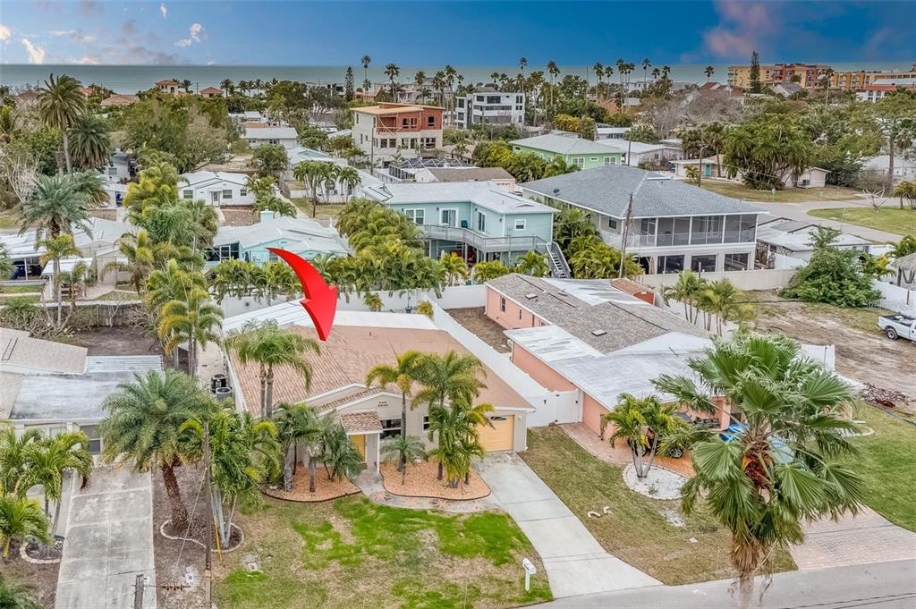 16108 Redington Drive Redington Beach, FL 33708 - Photo 5 of 13 an aerial view of residential house with outdoor space and swimming pool