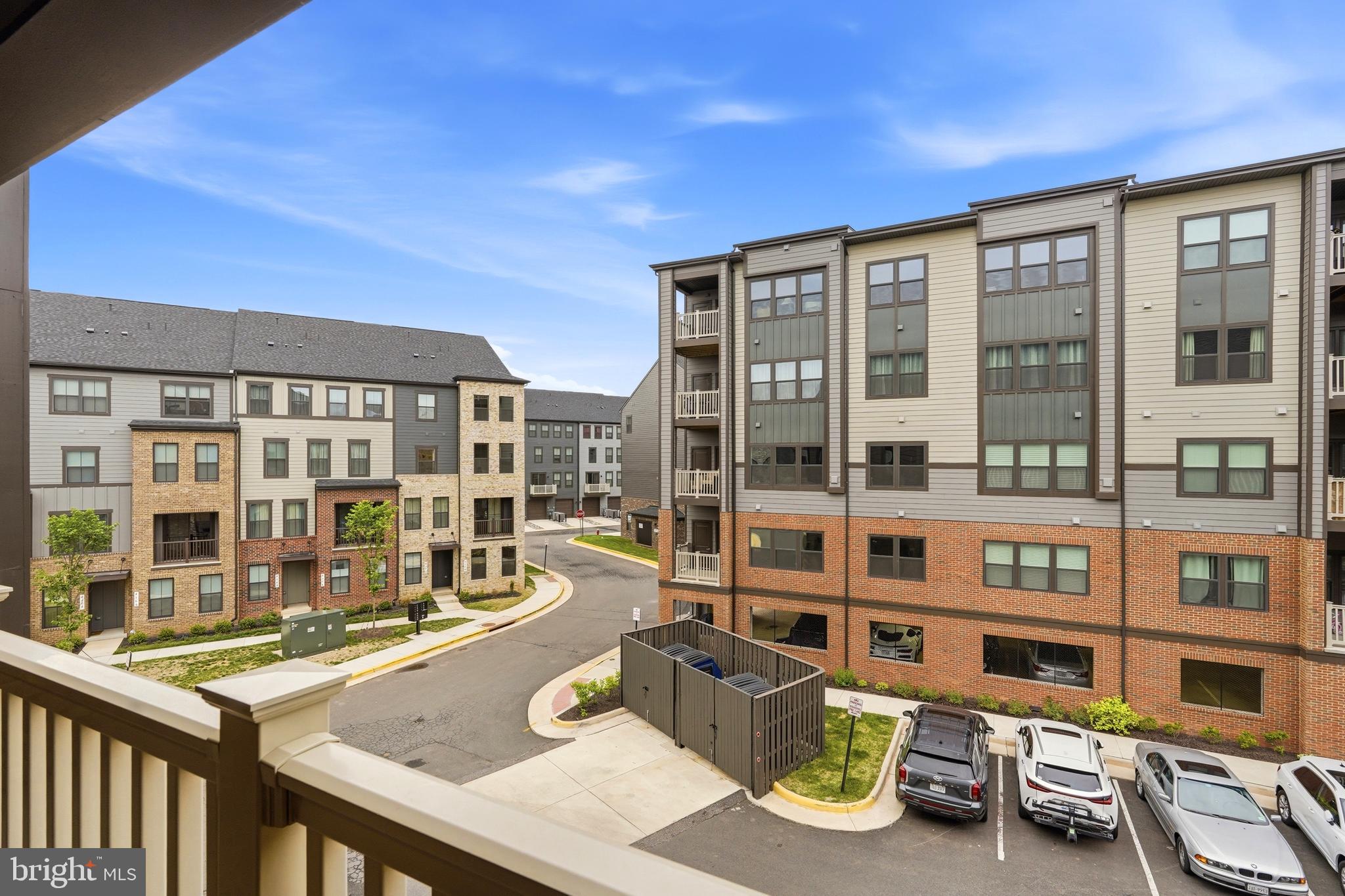 14538 George Carter Way, Unit 287 Chantilly, VA 20151 - Photo 32 of 87 a front view of a building with street view