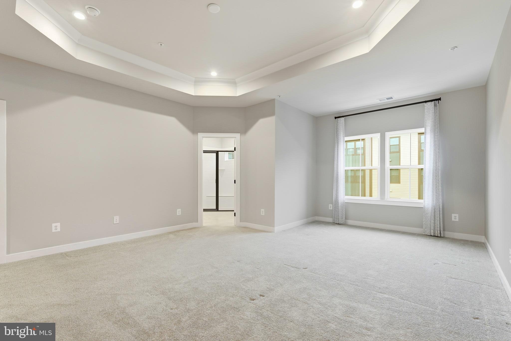 14538 George Carter Way, Unit 287 Chantilly, VA 20151 - Photo 38 of 87 a view of an empty room with a window