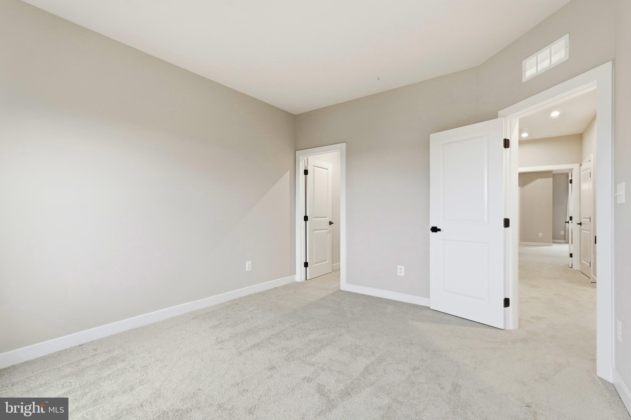 14538 George Carter Way, Unit 287 Chantilly, VA 20151 - Photo 51 of 87 a view of an empty room
