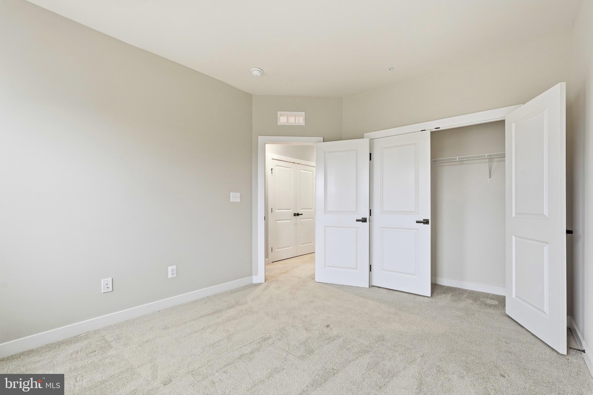 14538 George Carter Way, Unit 287 Chantilly, VA 20151 - Photo 54 of 87 a view of an empty room