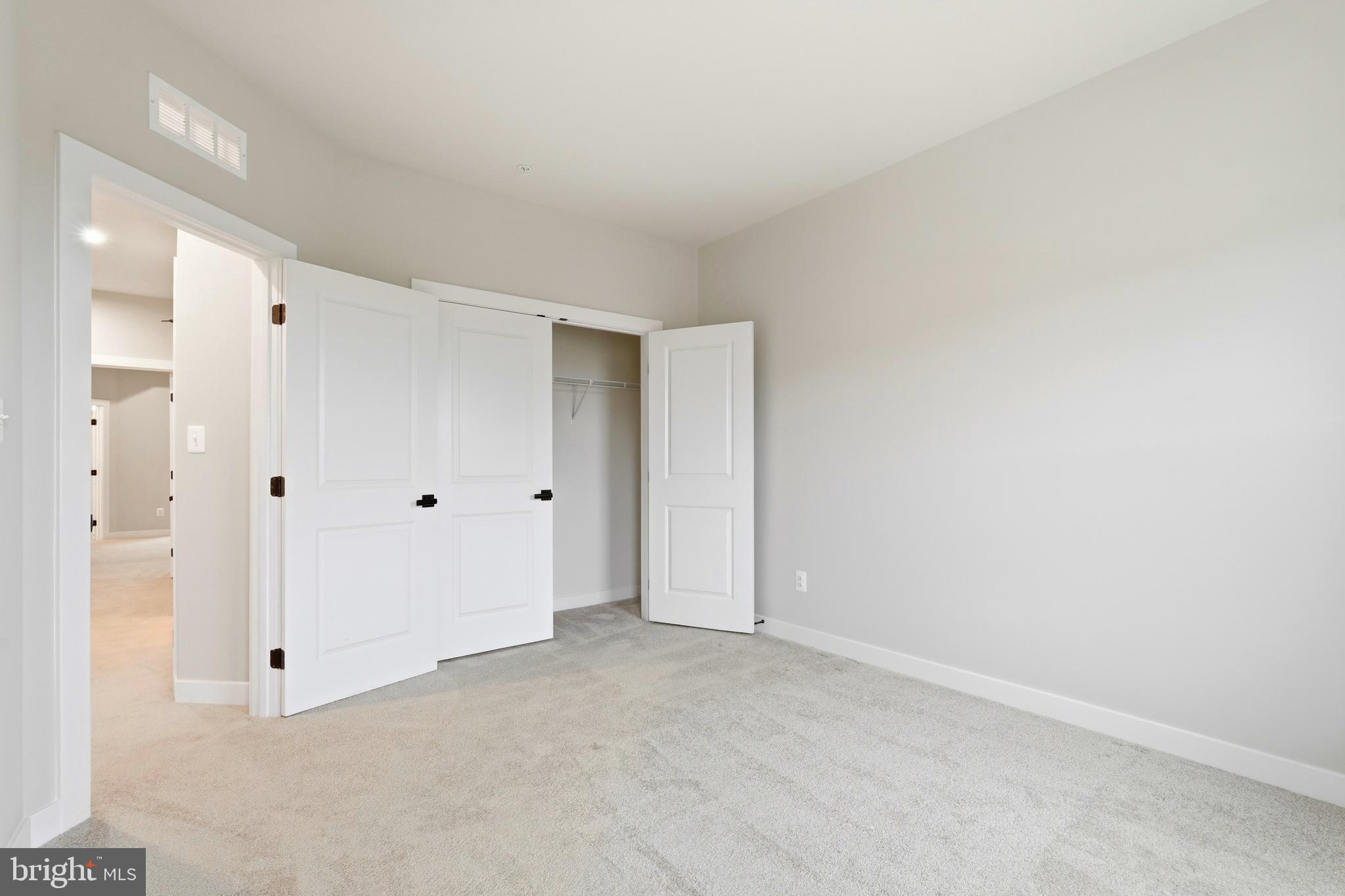 14538 George Carter Way, Unit 287 Chantilly, VA 20151 - Photo 55 of 87 a view of an empty room