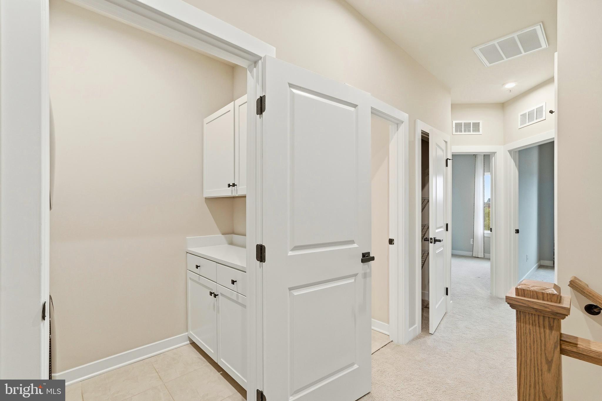 14538 George Carter Way, Unit 287 Chantilly, VA 20151 - Photo 60 of 87 a view of a walk in closet