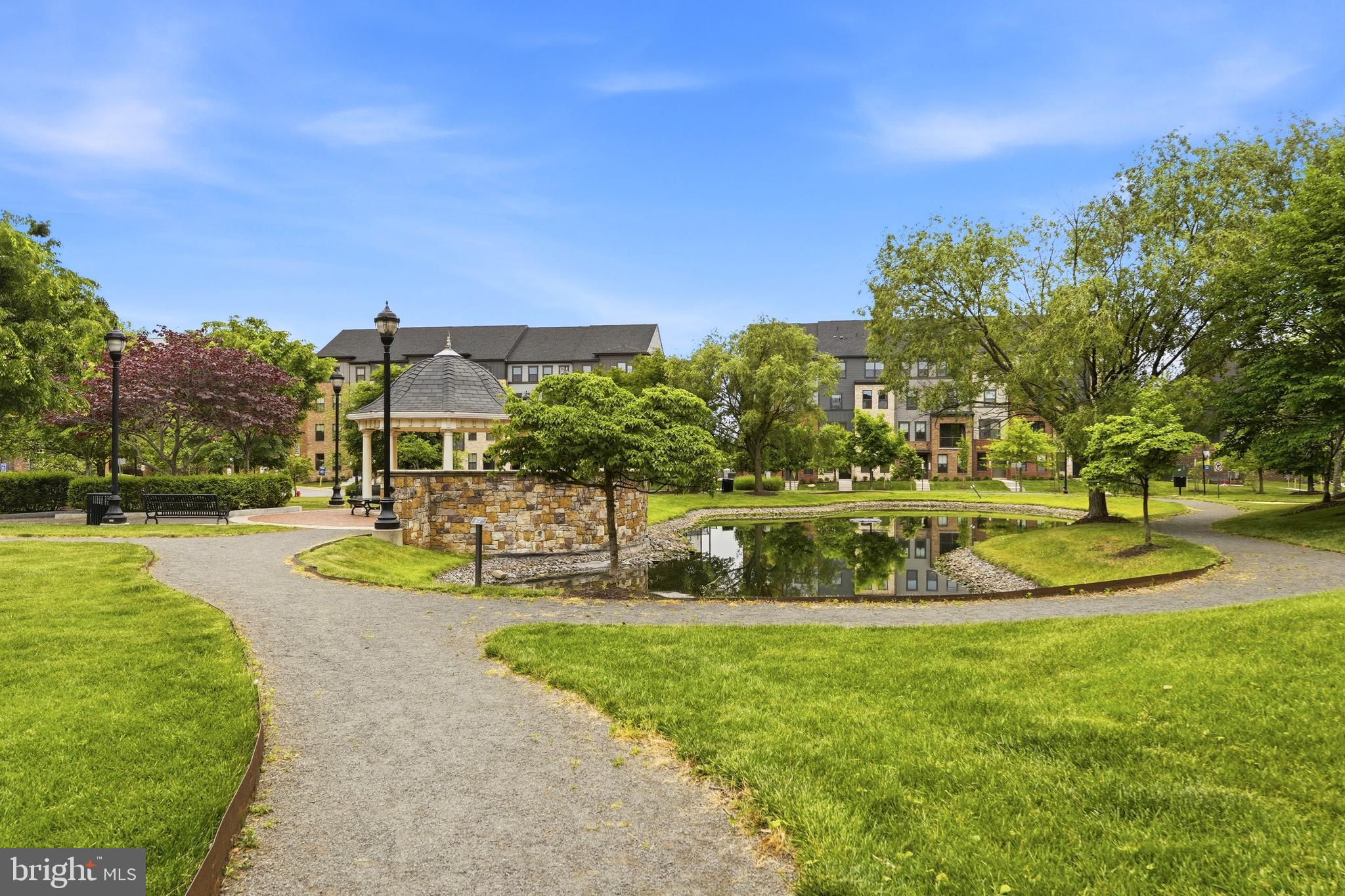 14538 George Carter Way, Unit 287 Chantilly, VA 20151 - Photo 73 of 87 a view of a swimming pool with a yard