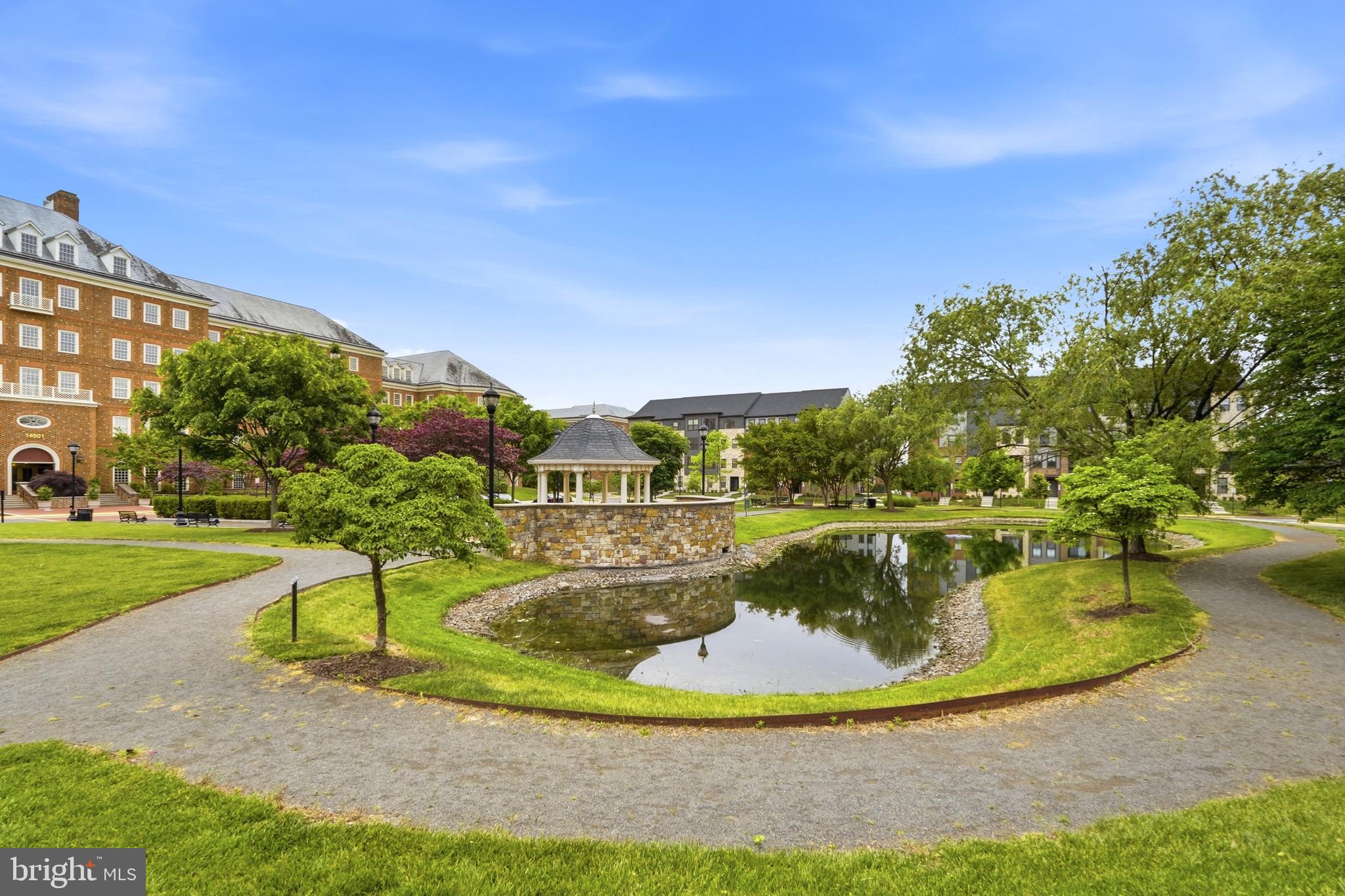 14538 George Carter Way, Unit 287 Chantilly, VA 20151 - Photo 74 of 87 a view of a swimming pool with a yard