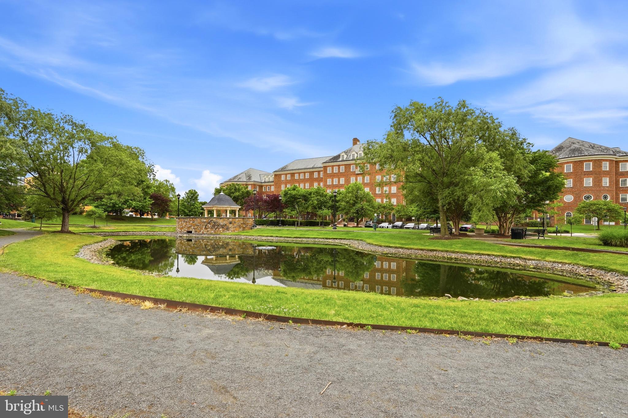 14538 George Carter Way, Unit 287 Chantilly, VA 20151 - Photo 76 of 87 a view of a lake with a big yard